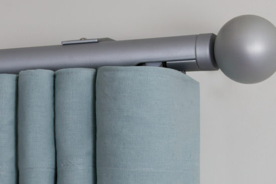 Silver curtain pole